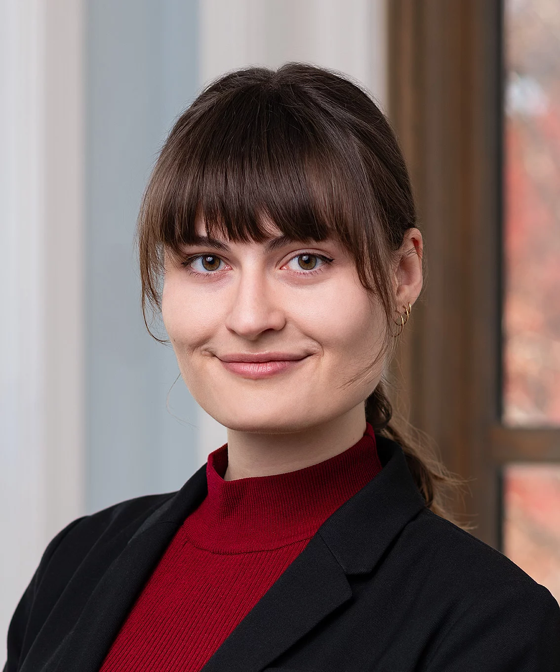 woman with brown hair smiling