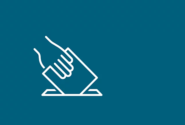White emblem on a blue background featuring a hand dropping a ballot into a ballot box.