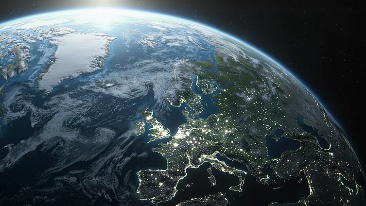 View of Earth's curvature showing North America, Atlantic Ocean, and Europe from space against black background